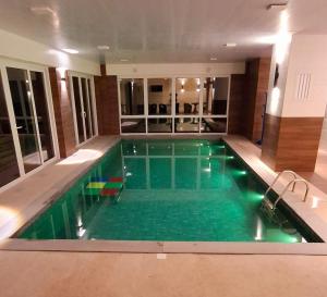 Swimmingpoolen hos eller tæt på Stilo Prime Flat com Hidro