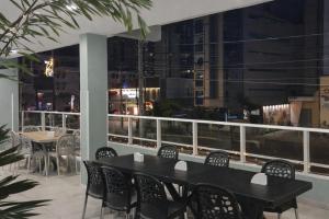 En balkon eller terrasse på Pousada Estrela Dourada