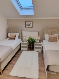 Giường trong phòng chung tại Elite Apartment Jasmina