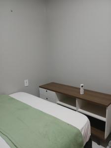 Postel nebo postele na pokoji v ubytování Mikeias sousa