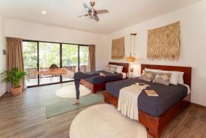 En eller flere senge i et værelse på La Veleta Hotel - Tulum Vibes - Pool View