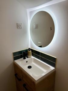 Koupelna v ubytování La Halte - T2 centre de Tinteniac + 8 fotografií