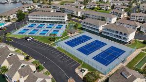an overhead view of a building with tennis courts at Waterfront Summer Vacay Free Private Beach Chairs & Umbrella Sleeps 5 in Destin