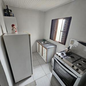 Køkken eller tekøkken på Descanso perfeito em São Gabriel + 12 billeder