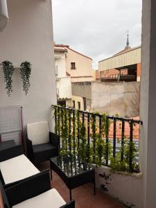 En balkon eller terrasse på Un Rincón en Alcalá
