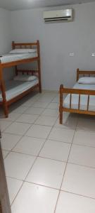 Postel nebo postele na pokoji v ubytování Hotel JRM