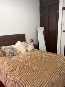 En eller flere senge i et værelse på Un Rincón en Alcalá