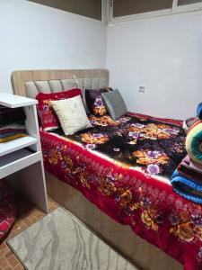 En eller flere senge i et værelse på Appartement meublée à RABAT for CAN 2025