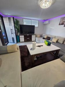 Et tv og/eller underholdning på Appartement meublée à RABAT for CAN 2025 + 29 billeder