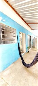 Casa aero في كامبيناس: أرجوحة في غرفة ذات جدار أزرق