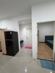 Postel nebo postele na pokoji v ubytování JJJ Homestay-SK One Garden City Residence + 18 fotografií