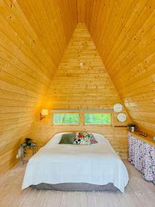 Postel nebo postele na pokoji v ubytování A-Frame Idyll On Öland With Magnificent Views