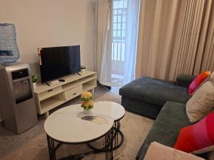TV a/nebo společenská místnost v ubytování Ben's Apartment