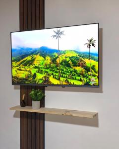 TV/trung tâm giải trí tại Nice apartment 15 meters from the park