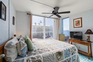 Postel nebo postele na pokoji v ubytování Alii Villas #232 condo