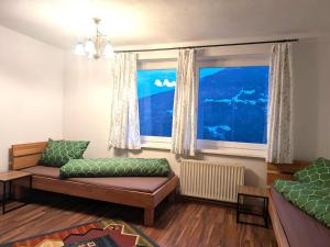 Postel nebo postele na pokoji v ubytování Gmarerhof