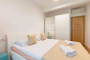 Ένα ή περισσότερα κρεβάτια σε δωμάτιο στο Apartment Pržno See View