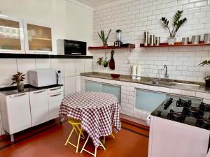 Køkken eller tekøkken på Casa Jutaí - your home in Belém