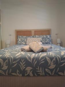 En eller flere senge i et værelse på Close to Shoal Bay Beach! + 14 billeder