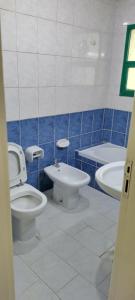 Gallery image of A bedroom with three beds for men only in Sharjah