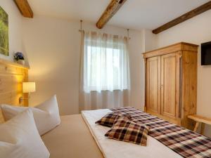 En eller flere senge i et værelse på in Spreewald holiday home No 1