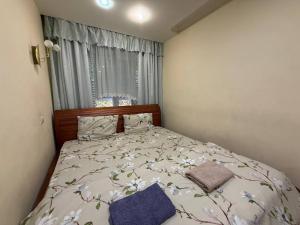 Postel nebo postele na pokoji v ubytování Воскресенская 12- 2 кв Евро Центр