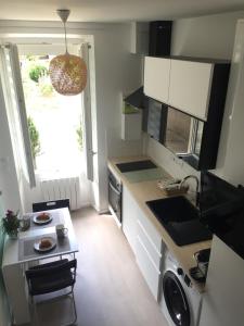 Køkken eller tekøkken på Malakoff Petit Montrouge Beau Studio