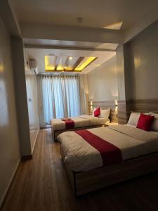 Ένα ή περισσότερα κρεβάτια σε δωμάτιο στο Myagdi Korola Guest House and Bhanchha Ghar +10 φωτογραφίες