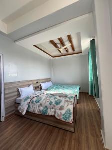 Ένα ή περισσότερα κρεβάτια σε δωμάτιο στο Myagdi Korola Guest House and Bhanchha Ghar