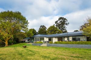a house with a large yard in front of it at Hahndorf Farm Barn in Hahndorf