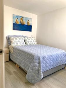 En eller flere senge i et værelse på Apartamento nuevo en Dosquebradas en El Eje Cafetero