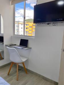 Et tv og/eller underholdning på Apartamento nuevo en Dosquebradas en El Eje Cafetero + 7 billeder