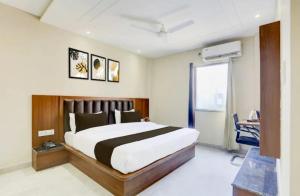 Postel nebo postele na pokoji v ubytování sunrise home stay