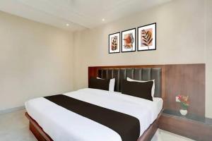 Postel nebo postele na pokoji v ubytování sunrise home stay + 1 fotografie