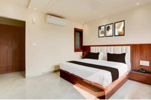 Postel nebo postele na pokoji v ubytování sunrise home stay