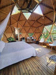 Postel nebo postele na pokoji v ubytování Prana Hills