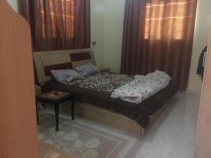 Giường trong phòng chung tại Very good apartment in Nouakchott