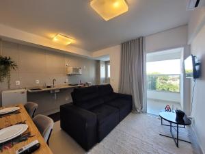 Et tv og/eller underholdning på Edificio LAVIT - Perto da Getulio com Piscina, Academia e Cowork