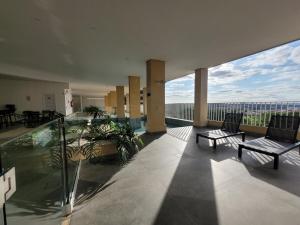 Et opholdsområde på Edificio LAVIT - Perto da Getulio com Piscina, Academia e Cowork