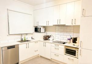 Kuchyň nebo kuchyňský kout v ubytování prime epsom