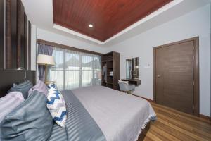 En eller flere senge i et værelse på Arterra Haven Aonang Krabi