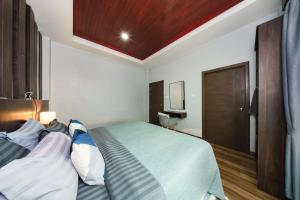 En eller flere senge i et værelse på Arterra Haven Aonang Krabi