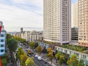 an aerial view of a city with tall buildings at ibis Paris Avenue d'Italie 13ème in Paris