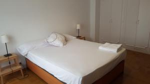 A bed or beds in a room at Apartamento Vuelta del Castillo