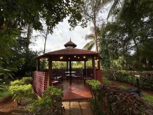 Zahrada ubytování NATUREs LAP FARM STAY Mysore