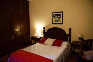 A bed or beds in a room at Casa Rural de Tío Félix