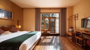 TV a/nebo společenská místnost v ubytování Moondance Boutique Resort