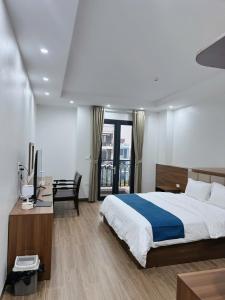 En eller flere senge i et værelse på Chenghotel