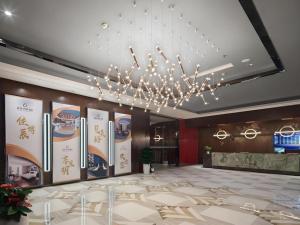 Μια τηλεόραση ή/και κέντρο ψυχαγωγίας στο VX Hotel Chengdu Wenjiang Guosetianxiang Chenyue