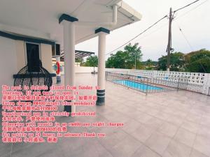 a picture of a swimming pool in a building at Area Indahpura or Taman Bersatu Kulai 3-4BR near AEON Airport JPO in Kulai